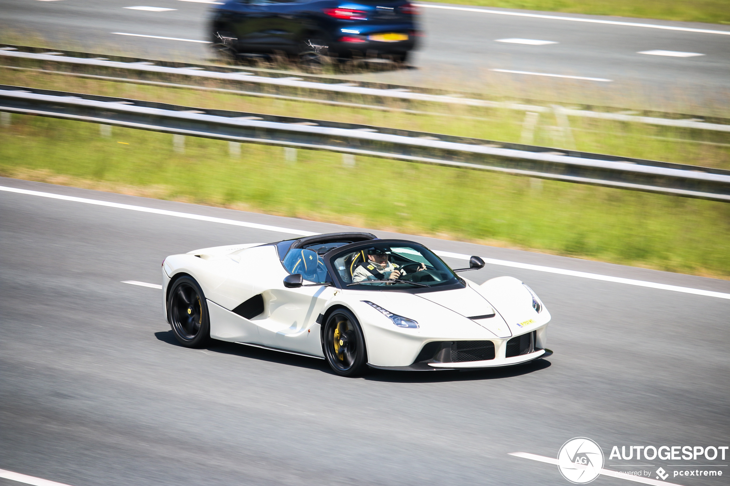 White Laferrari Aperta on the highway