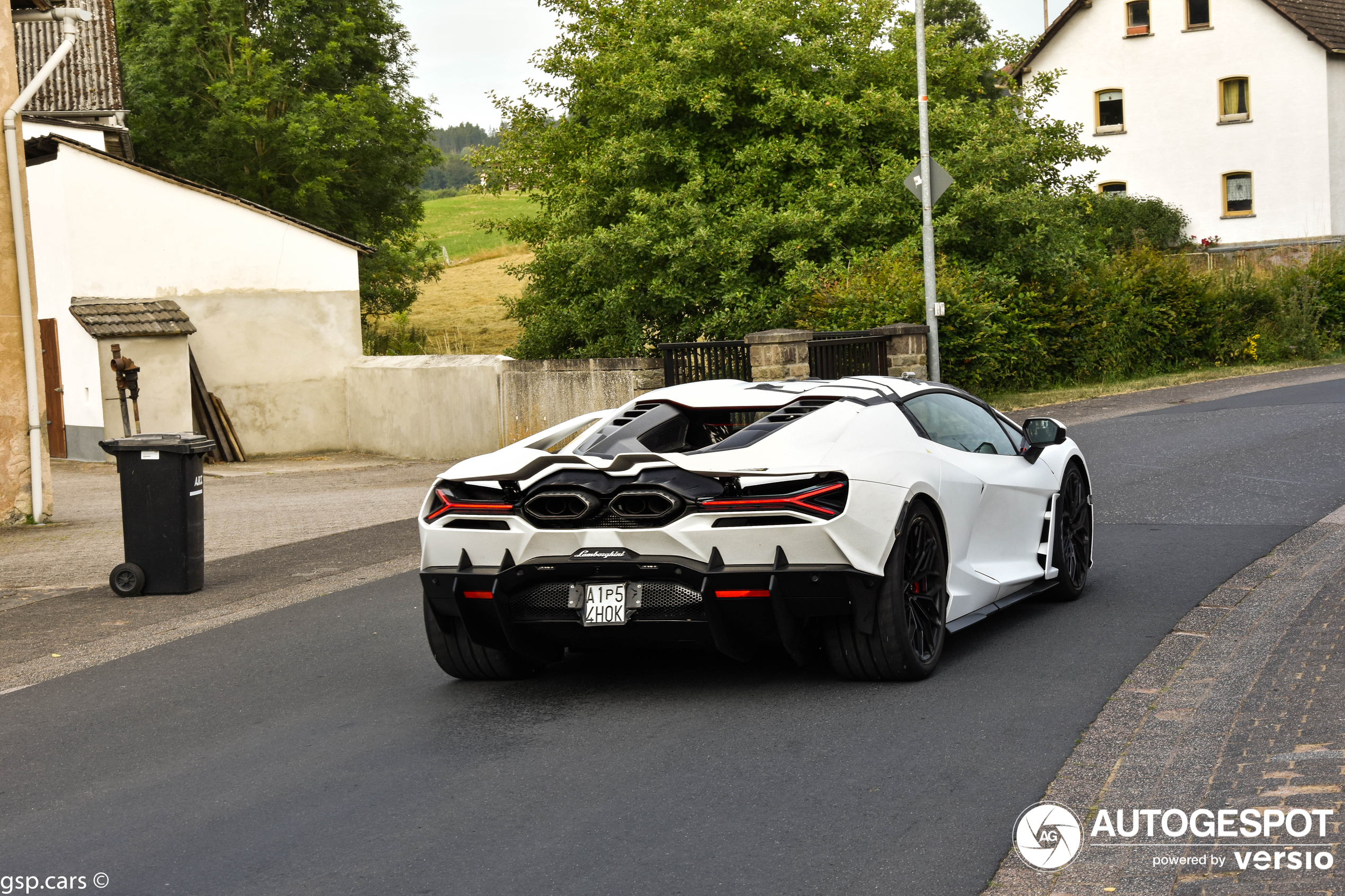 A white Revuelto on its test drive in Welerath