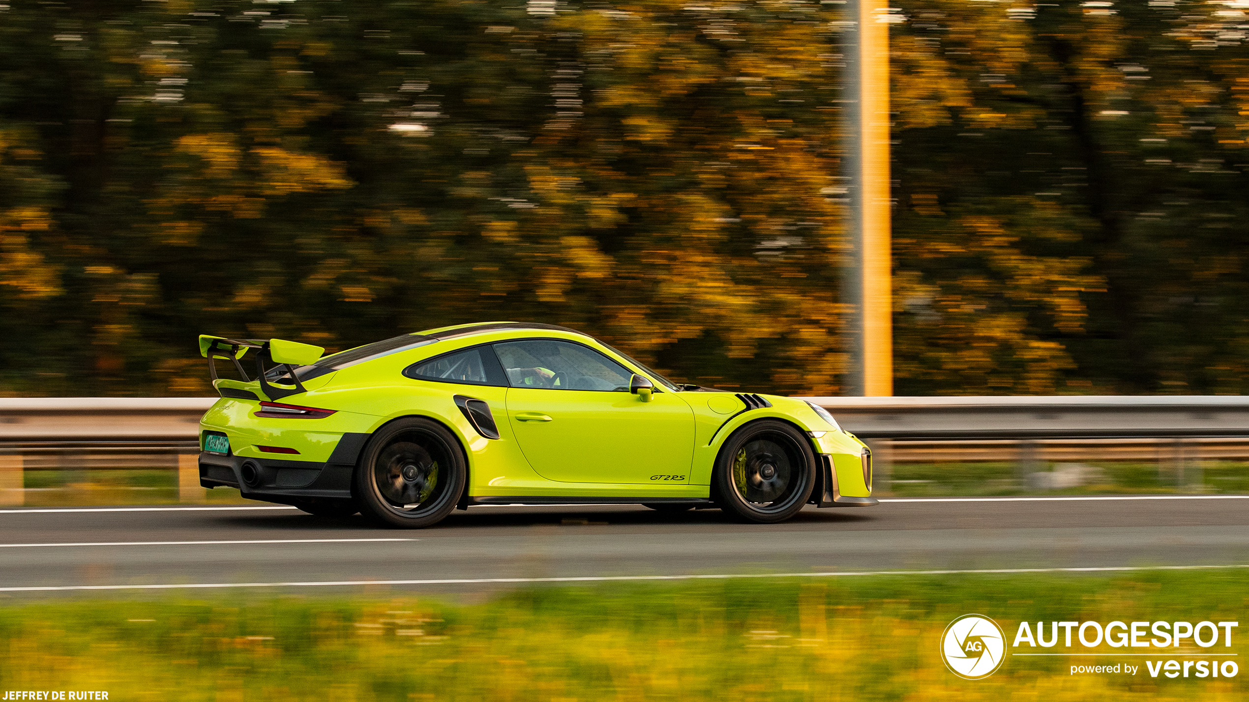 A pretty cool GT2 RS races down the highway