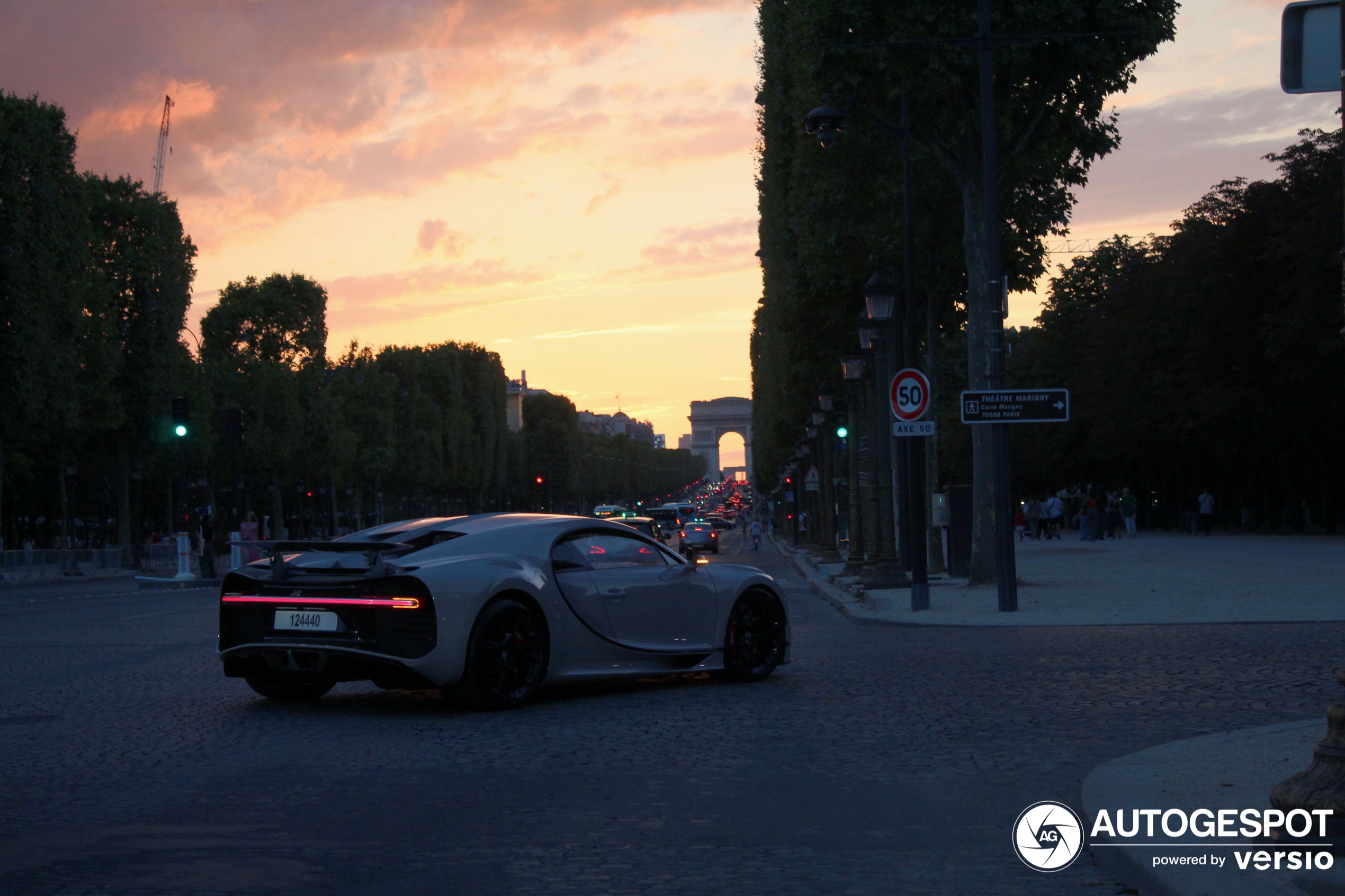 A Chiron shows up in paris during a beautiful sunset
