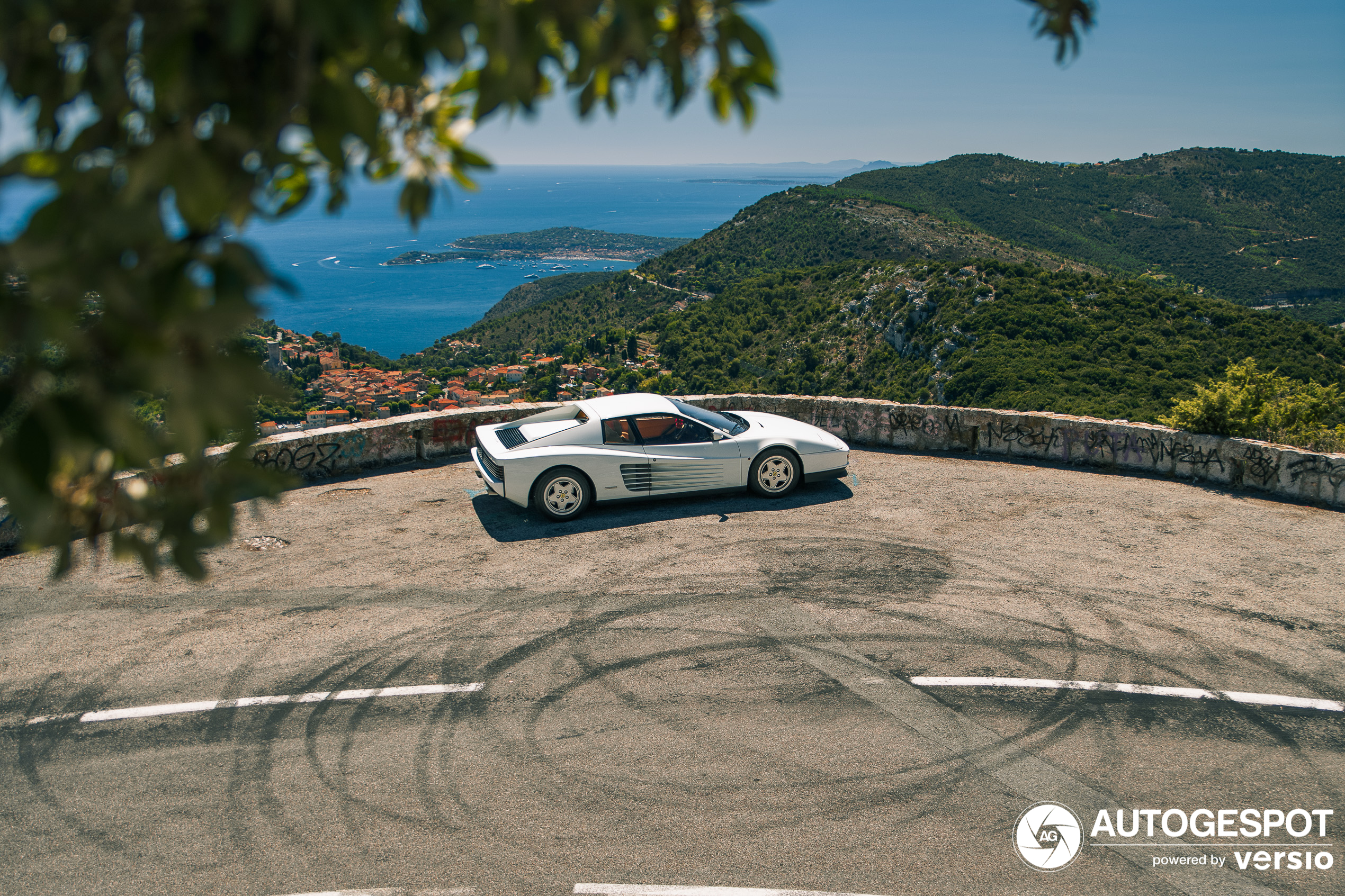 A white Testarossa captured in the mountains of southern France