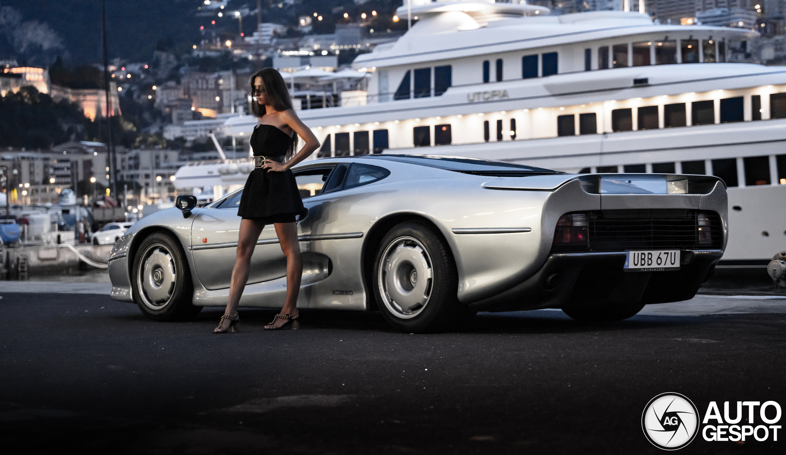 The super sports car Jaguar is featured as a model in the harbor of Monaco.