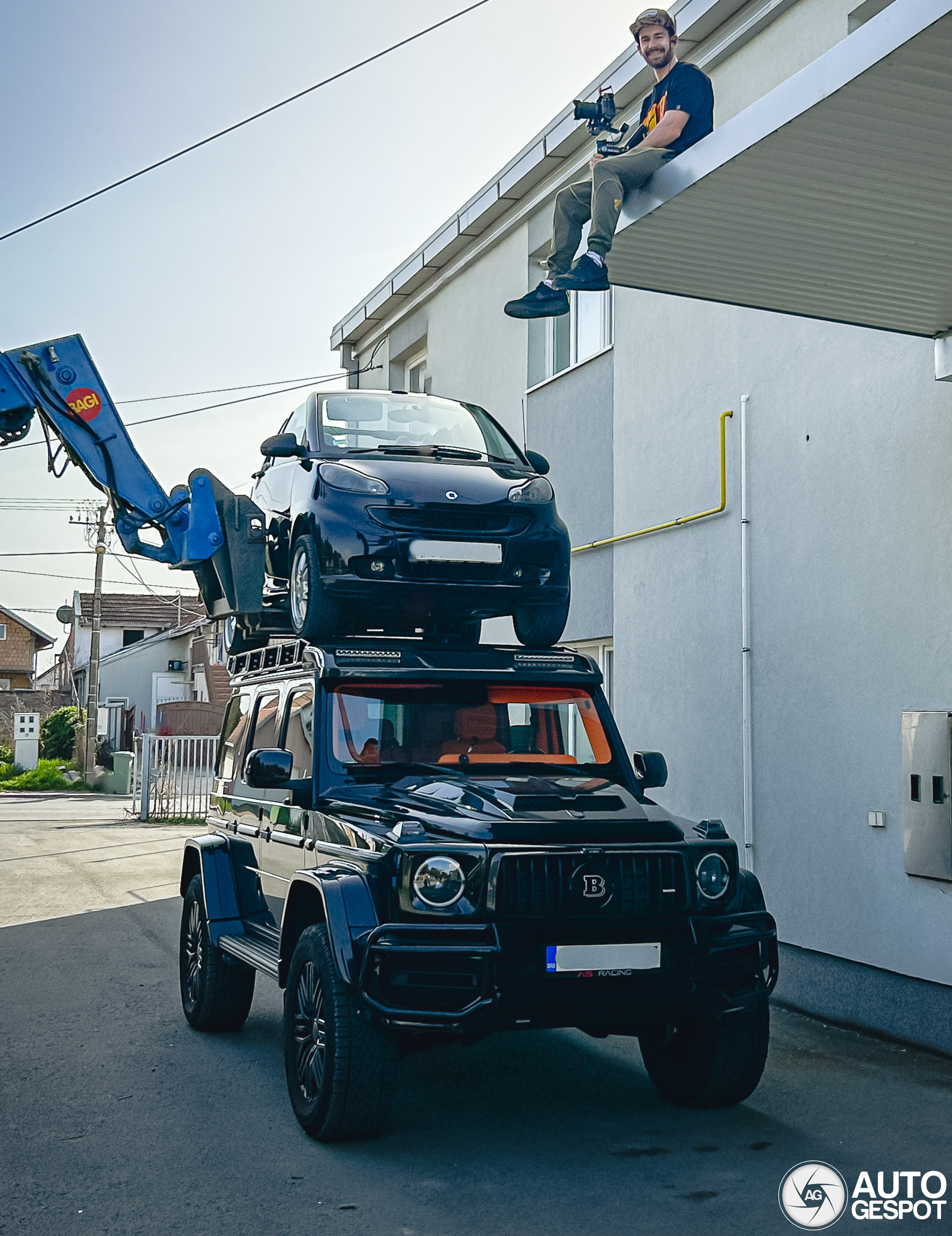 Smart Idea or just for show? G-Wagon sports Smart car as rooftop accessory