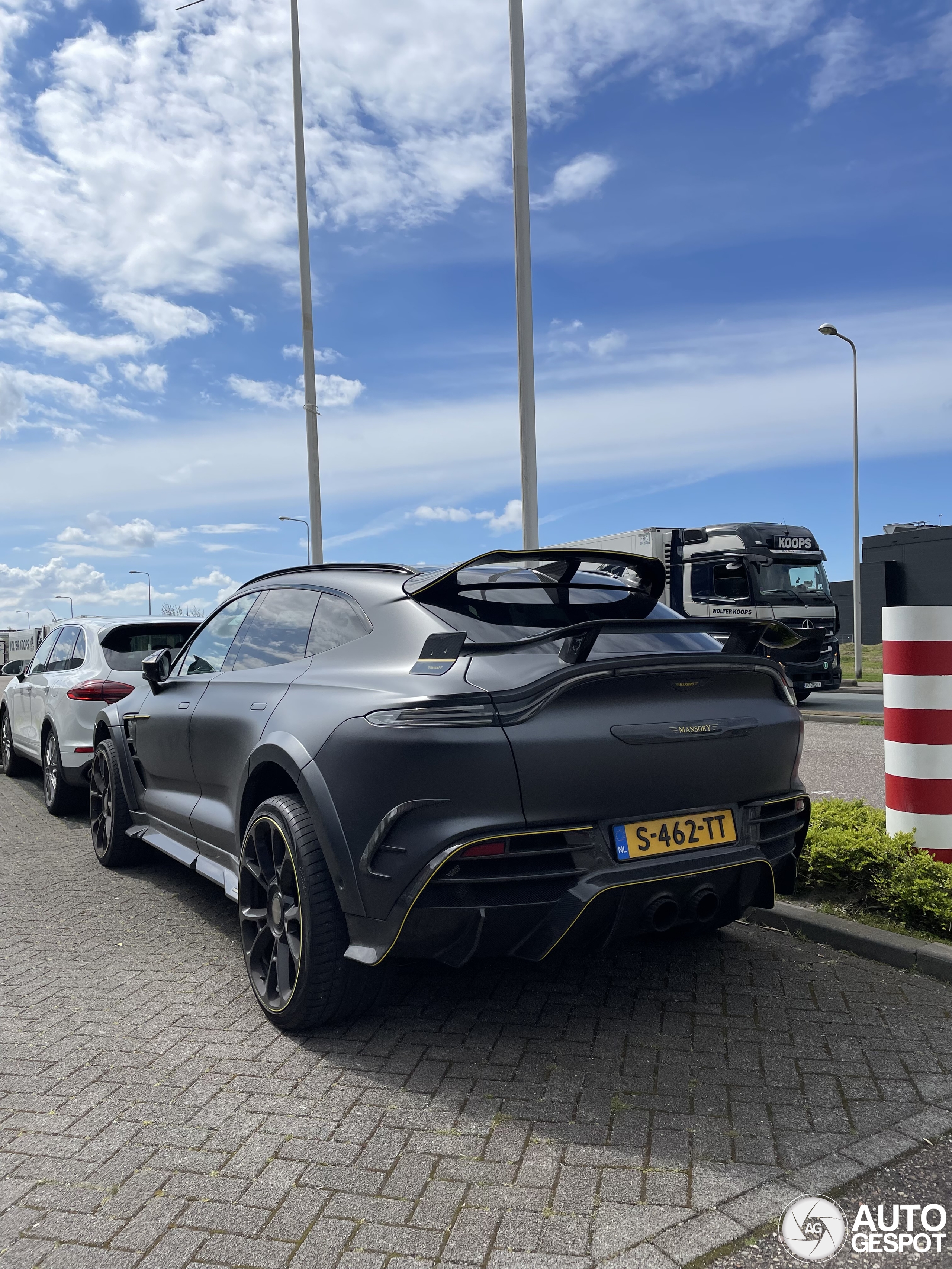 An SUV with a massive rear spoiler