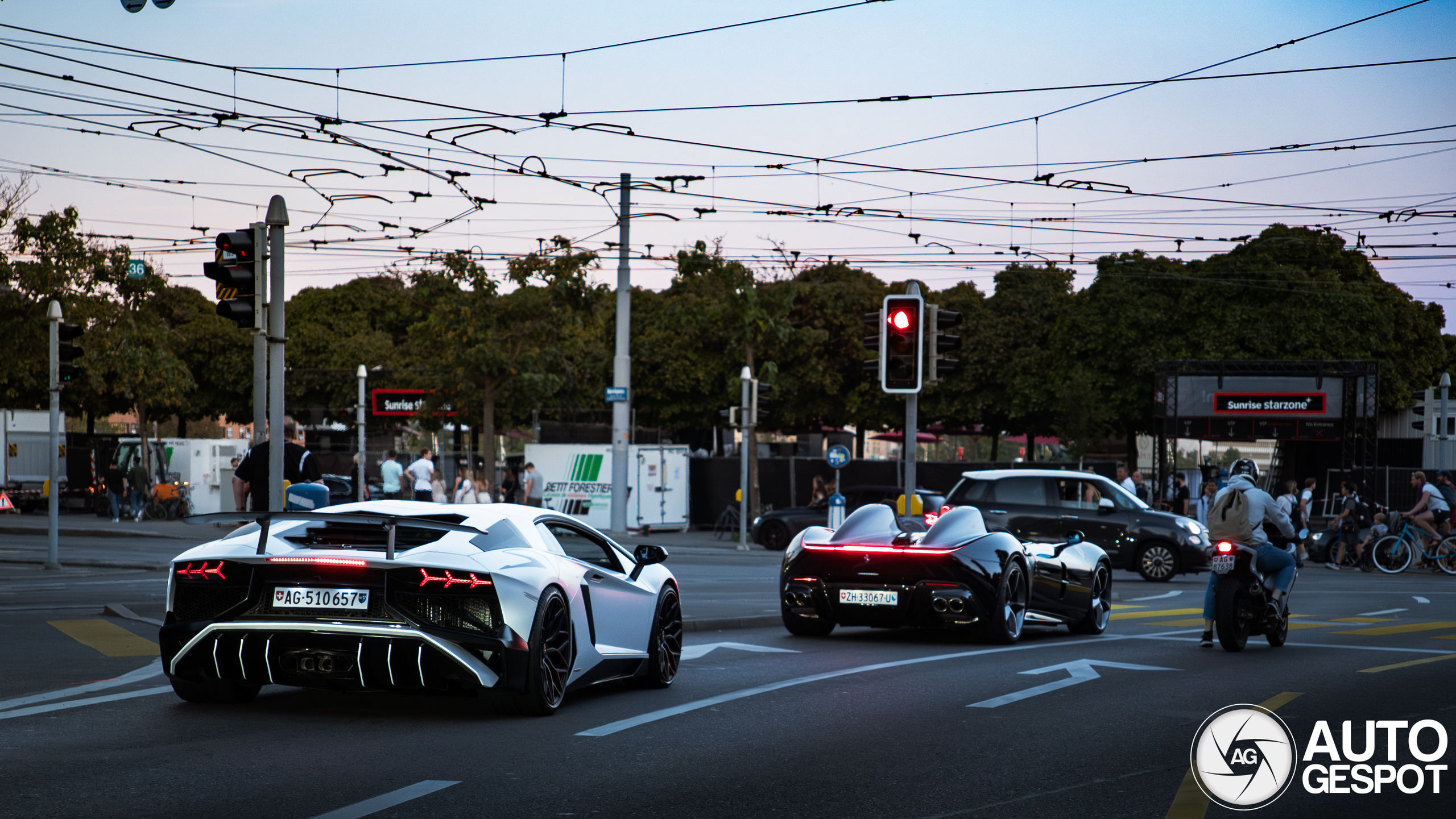 An Aventador SV and a Monza SP2 drive together through Zurich