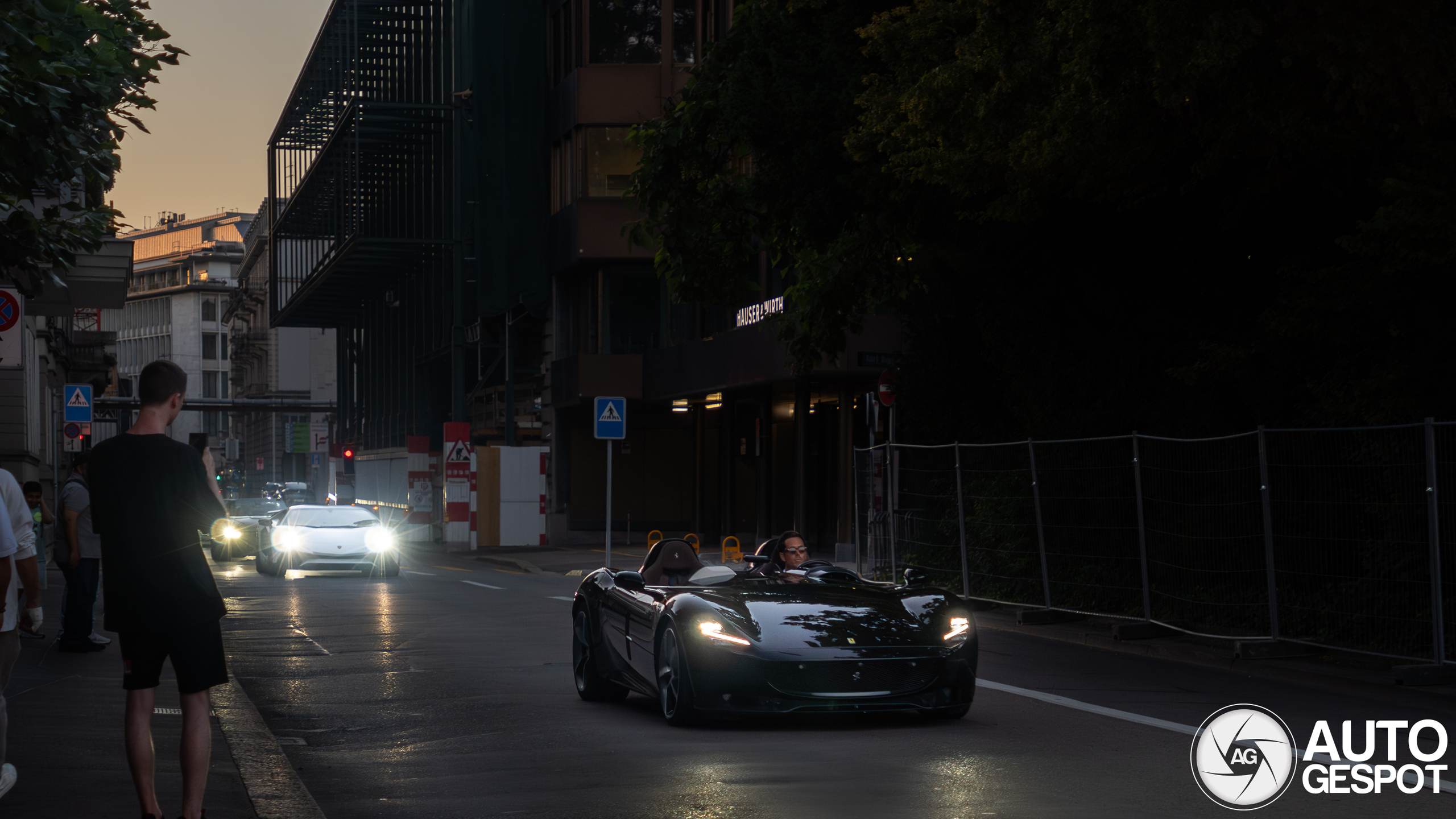 An Aventador SV and a Monza SP2 drive together through Zurich