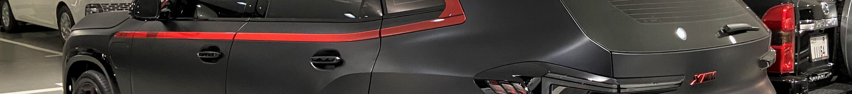 BMW XM G09 Label Red