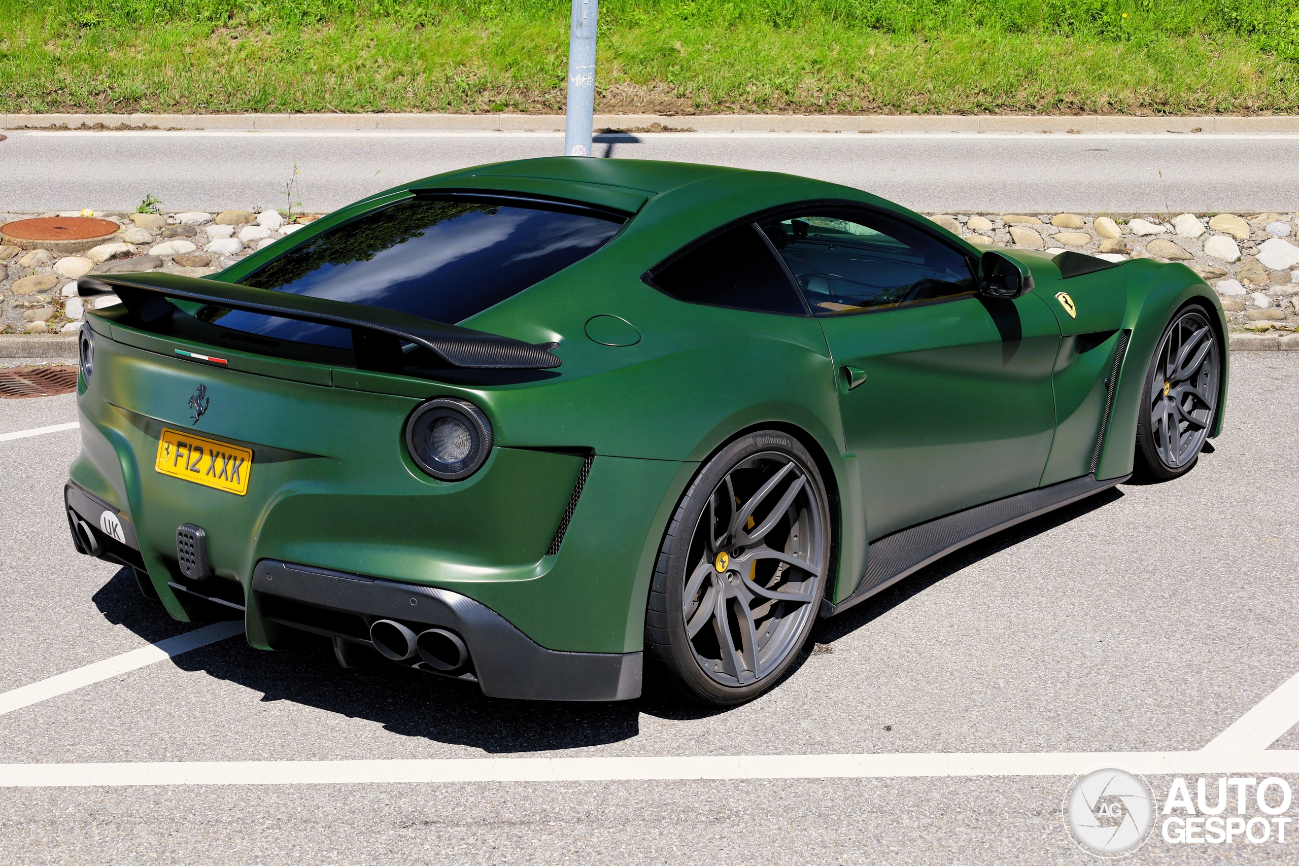 The green Ferrari Novitec Rosso F12 N-Largo appears in Switzerland