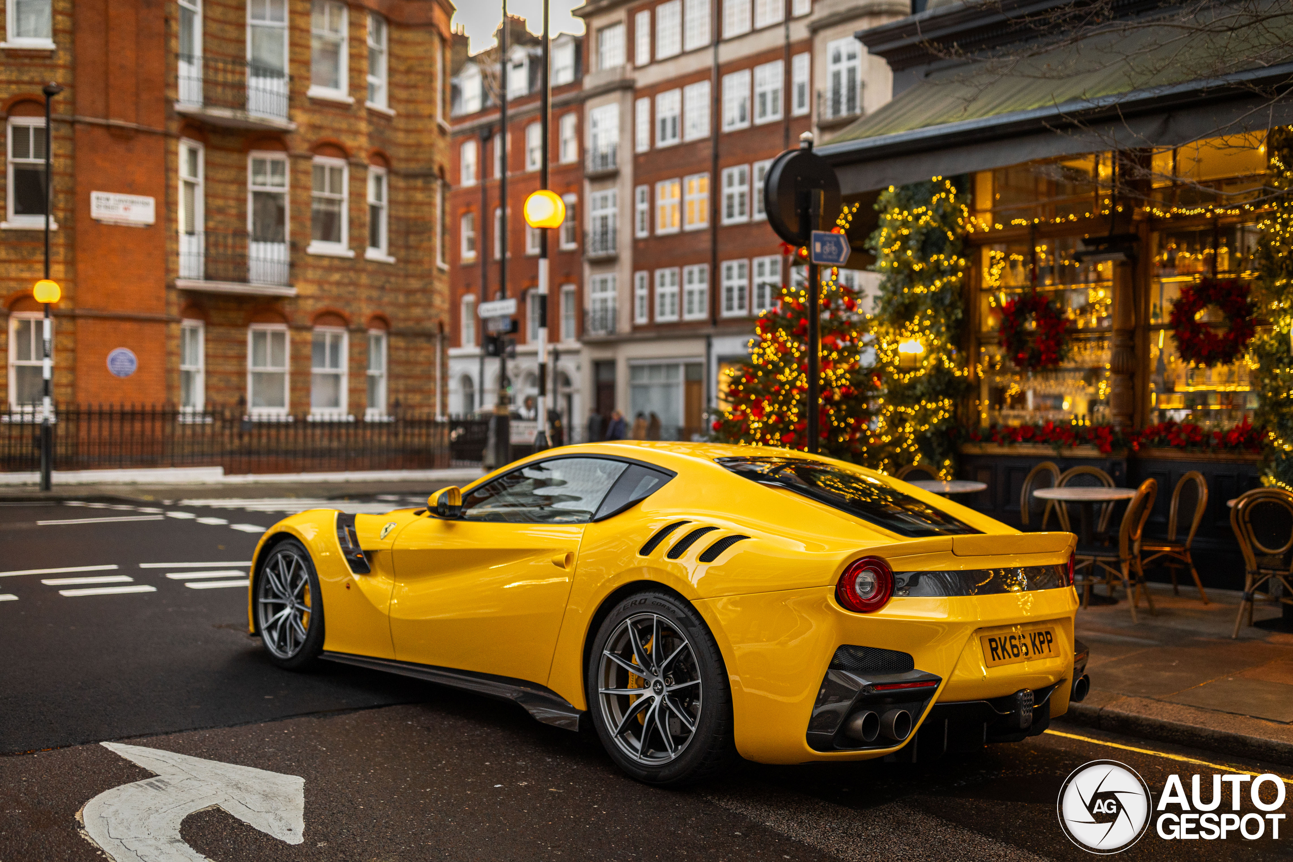Festive elegance: A yellow Ferrari F12tdf lights up London Christmas