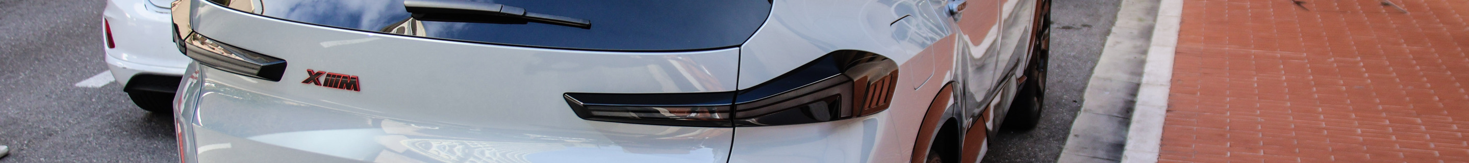 BMW XM G09 Label Red