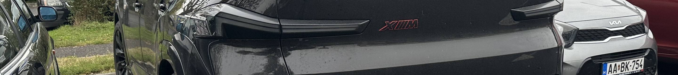 BMW XM G09 Label Red